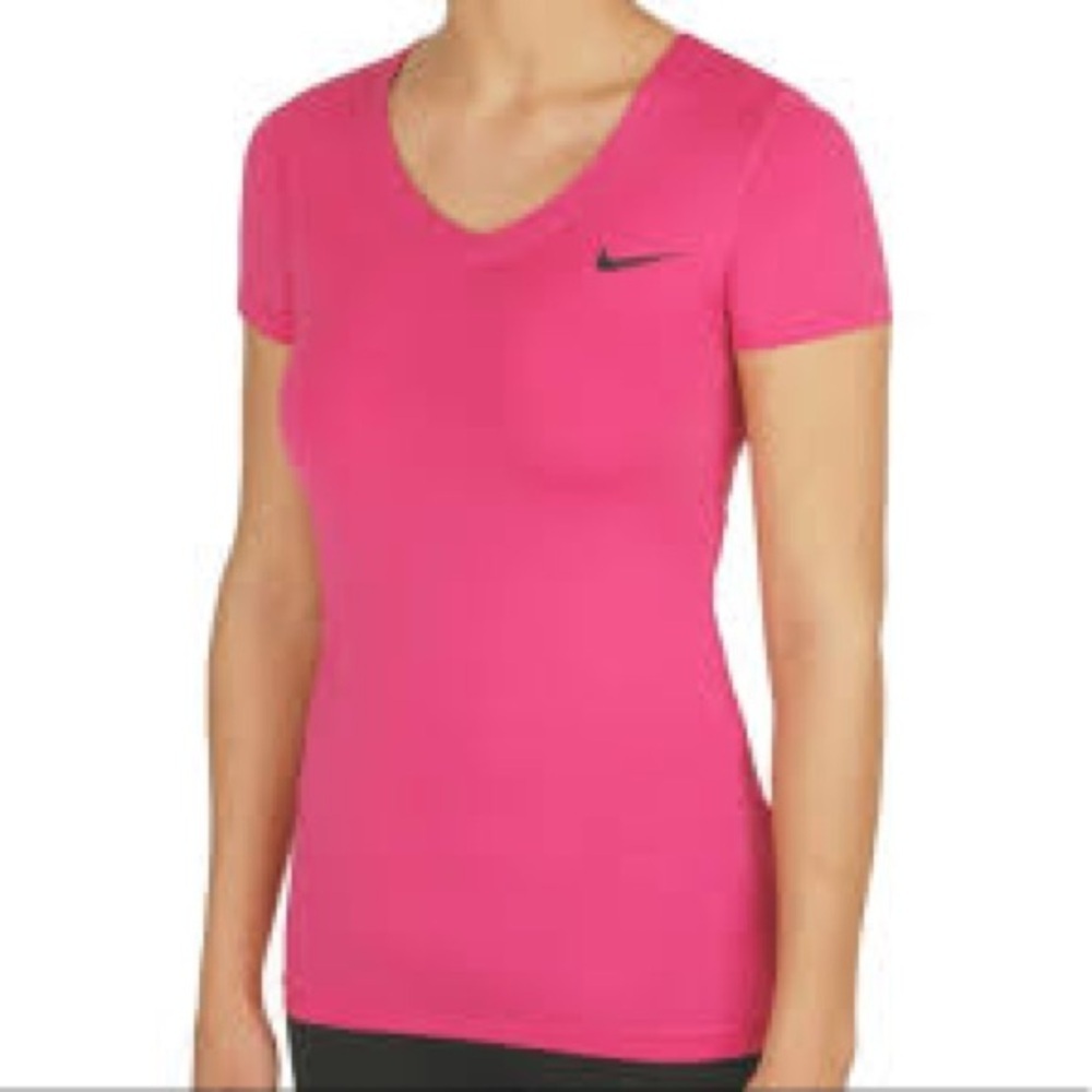 Nike Women's Bright Pink Short Sleeve Active top. Medium